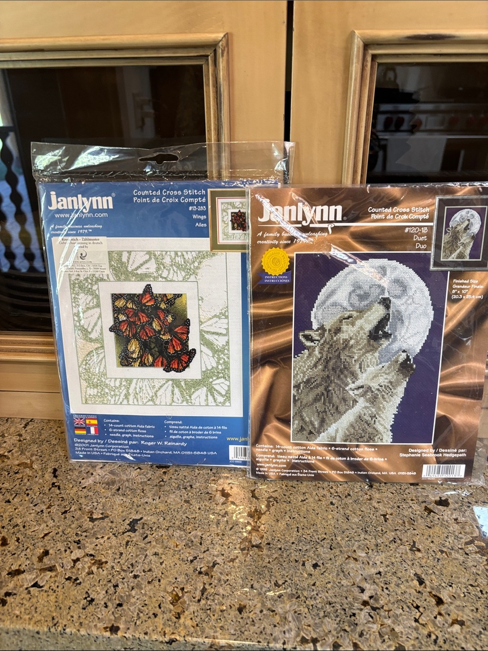 Butterflies and wolves cross stitch
